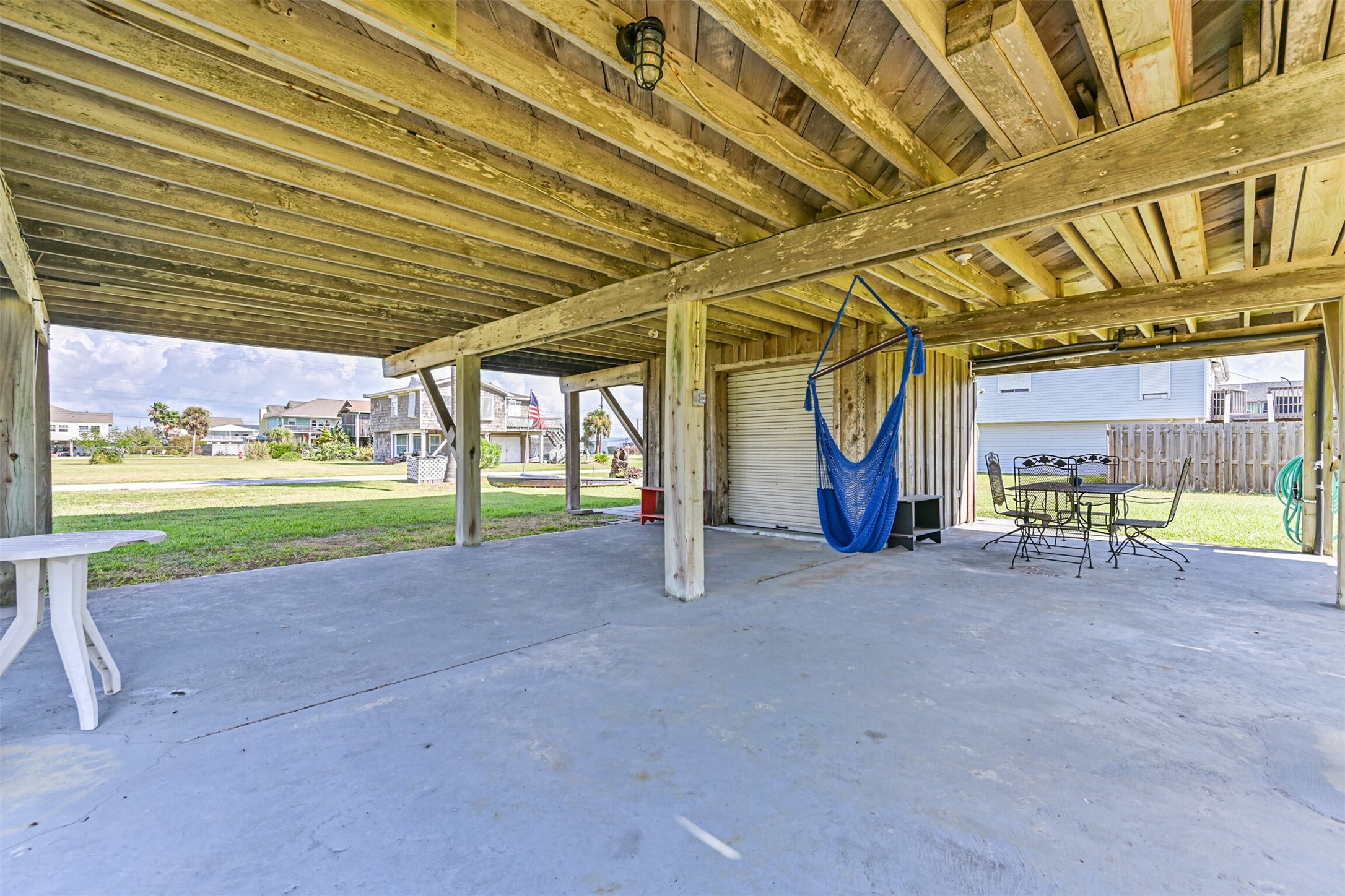 16519 Captain Kidd Road Jamaica Beach, TX 77554 - Photo 27 of 32 a view of a house with outdoor space
