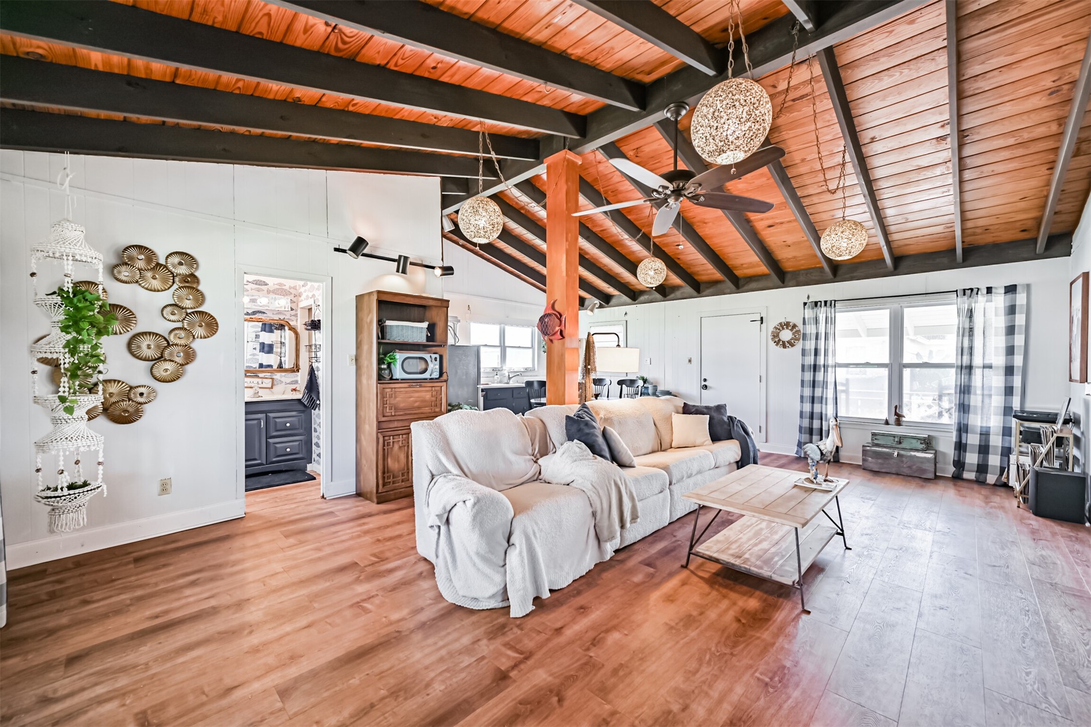 16519 Captain Kidd Road Jamaica Beach, TX 77554 - Photo 5 of 32 a bed room with furniture and a window