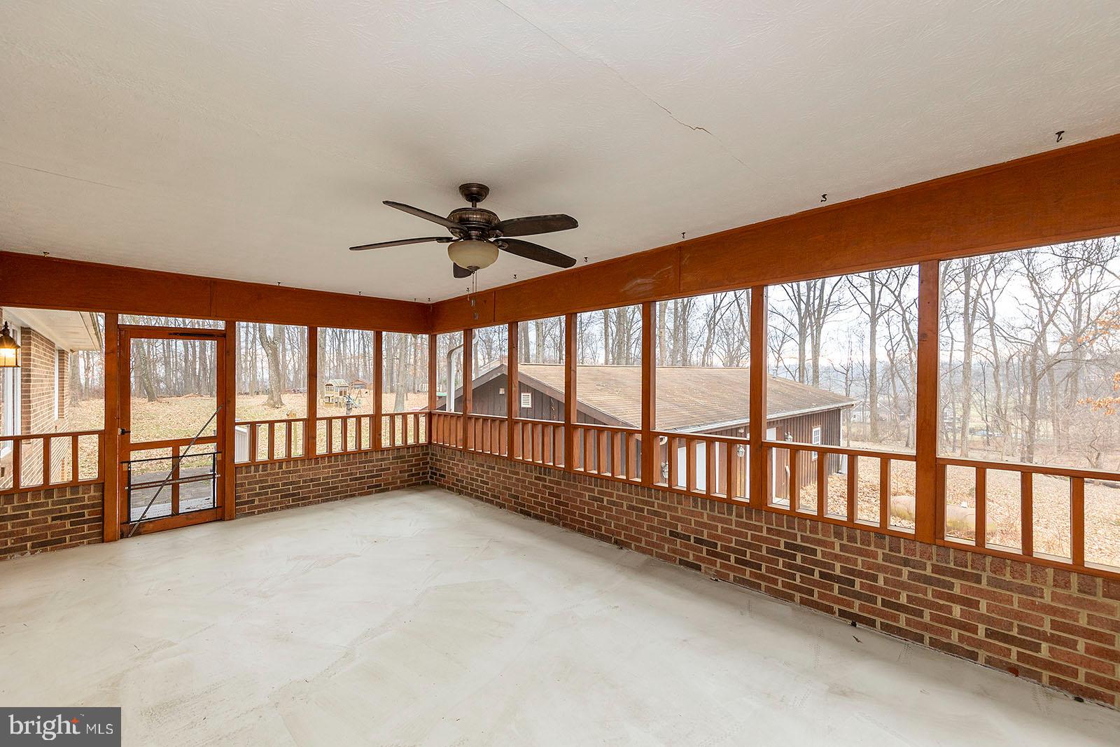 208 McGuire Road Winchester, VA 22603 - Photo 3 of 57 Screened porch