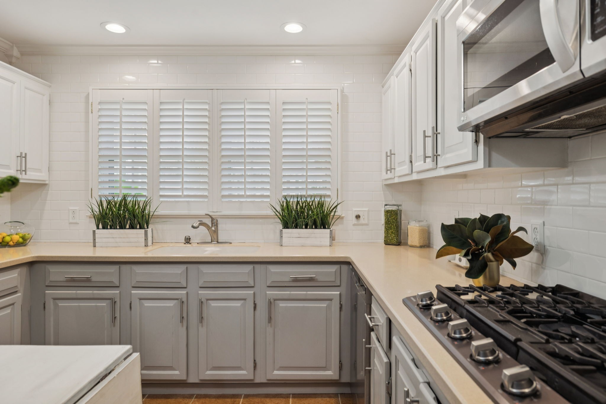 121 Pebble View Drive Franklin, TN 37064 - Photo 16 of 49 a kitchen with white cabinets and white appliances