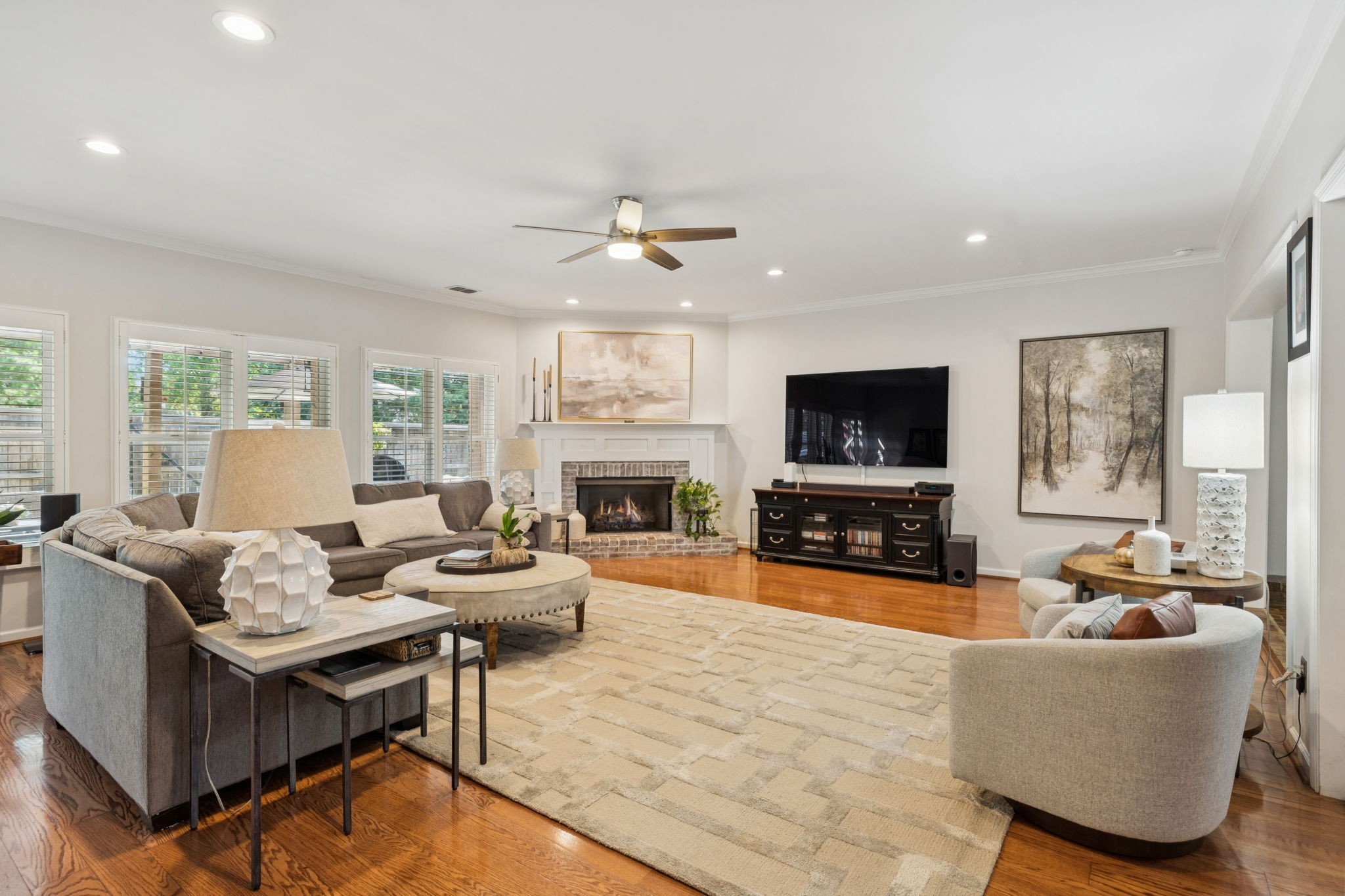 121 Pebble View Drive Franklin, TN 37064 - Photo 24 of 49 a living room with fireplace furniture and a flat screen tv