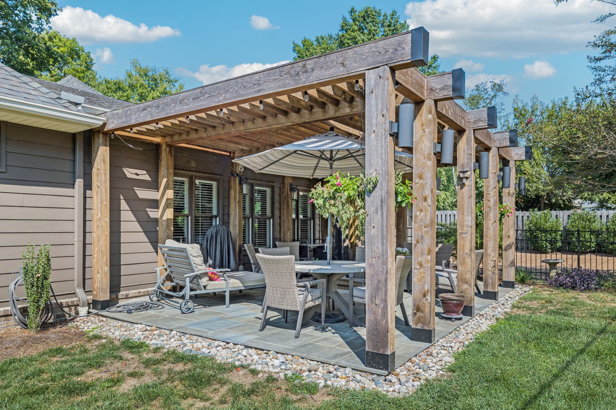 121 Pebble View Drive Franklin, TN 37064 - Photo 37 of 49 a view of a patio with table and chairs and potted plants