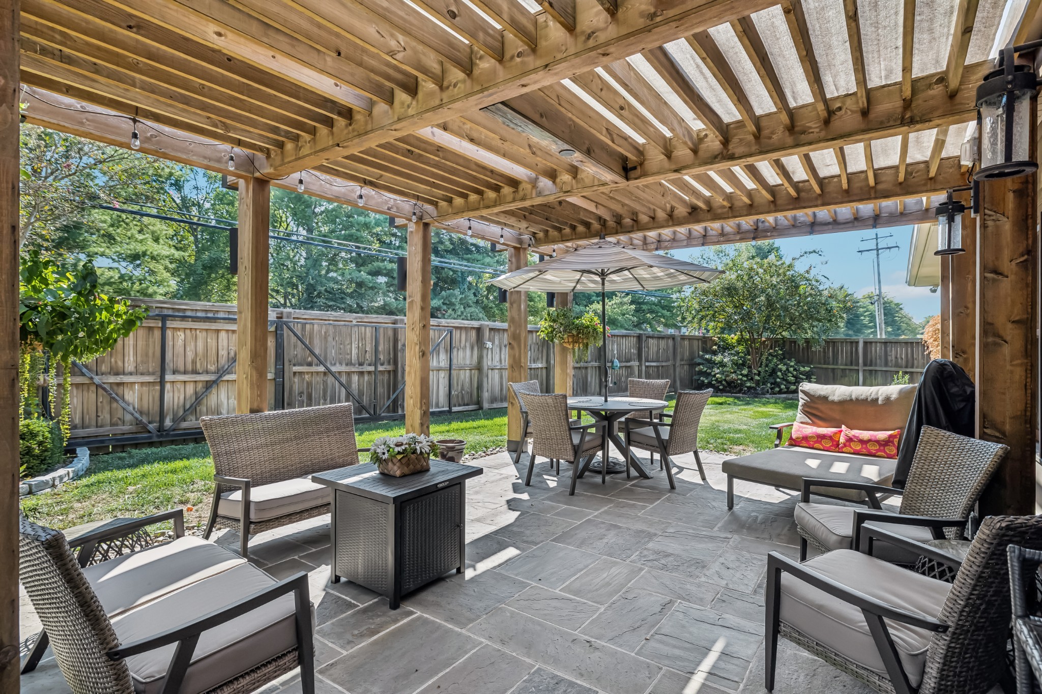 121 Pebble View Drive Franklin, TN 37064 - Photo 46 of 49 a view of a patio with couches chairs and a wooden floor
