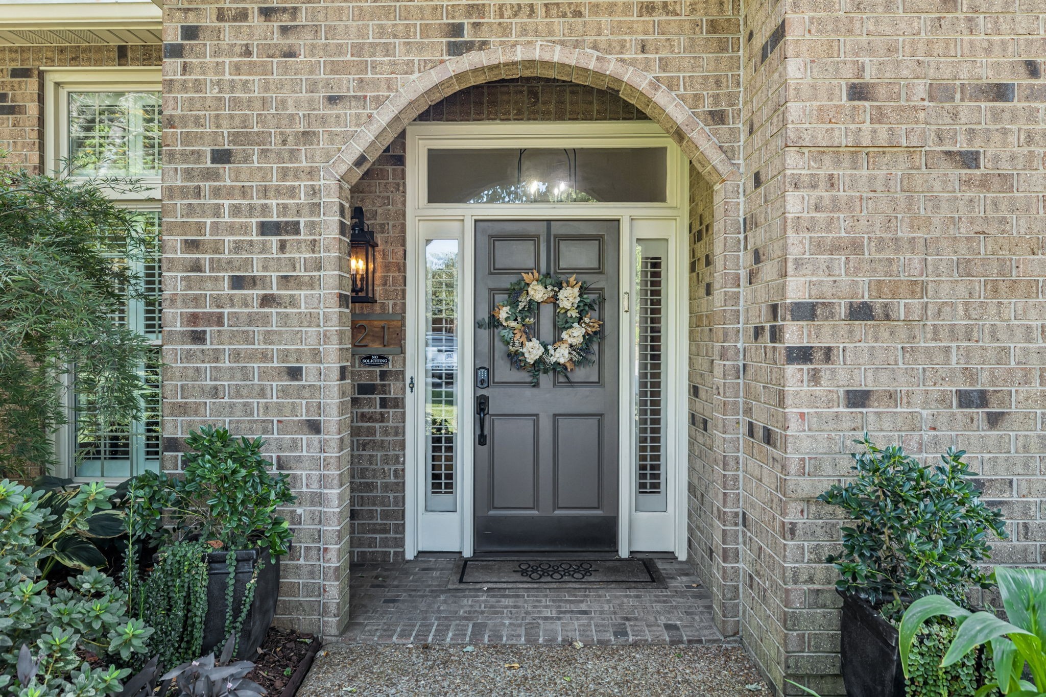 121 Pebble View Drive Franklin, TN 37064 - Photo 6 of 49 a view of a brick house with potted plants