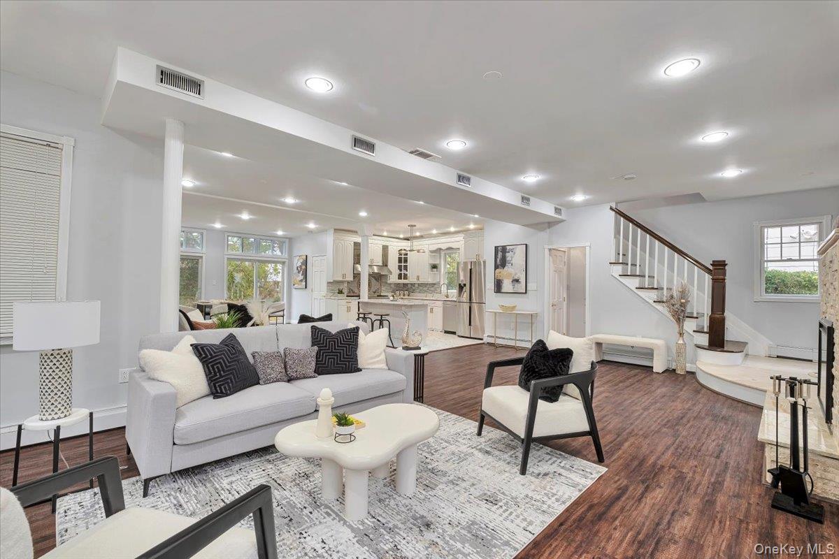 193 Nelson Road Scarsdale, NY 10583 - Photo 4 of 37 a living room with furniture and a wooden floor