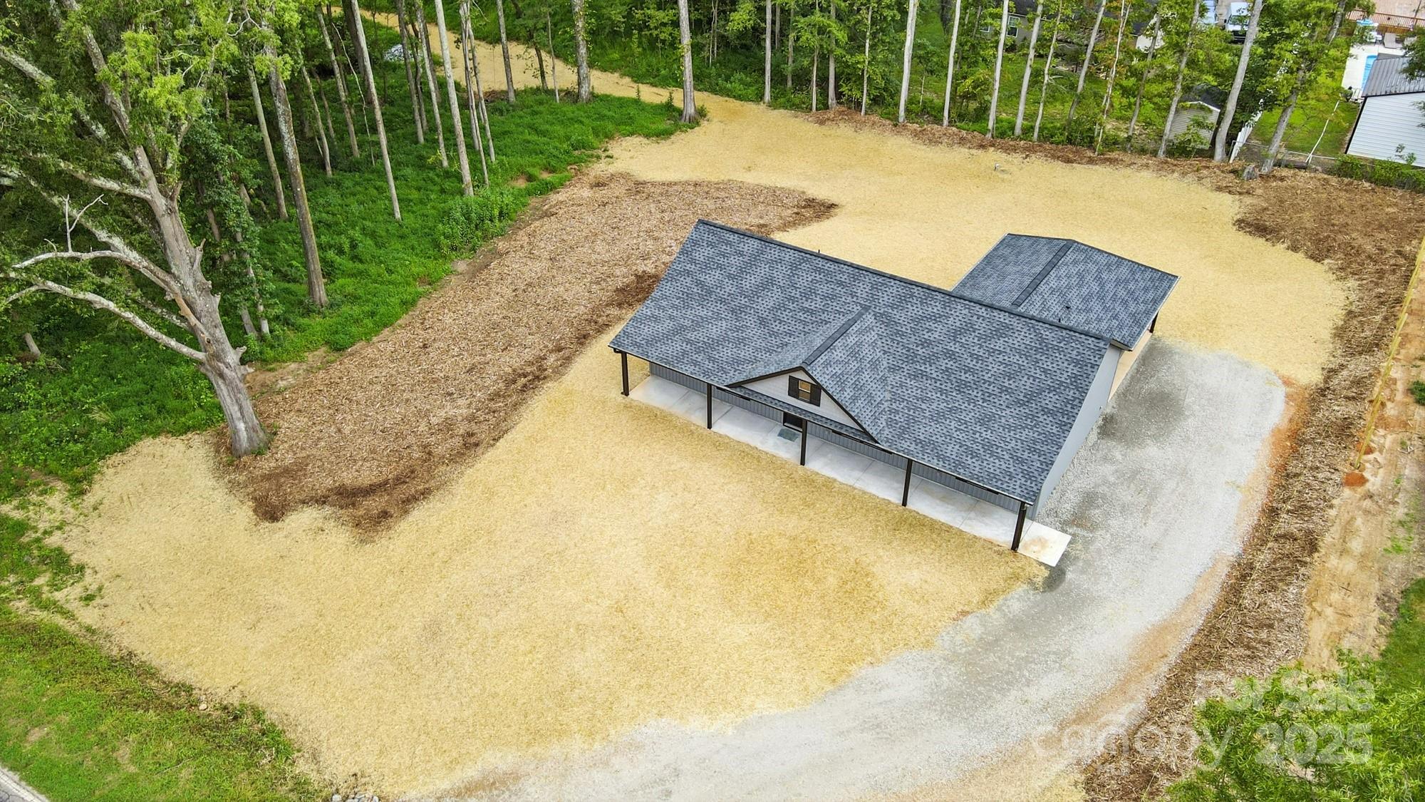 251 Lincoln Road York, SC 29745 - Photo 2 of 30 a view of swimming pool with a patio and garden