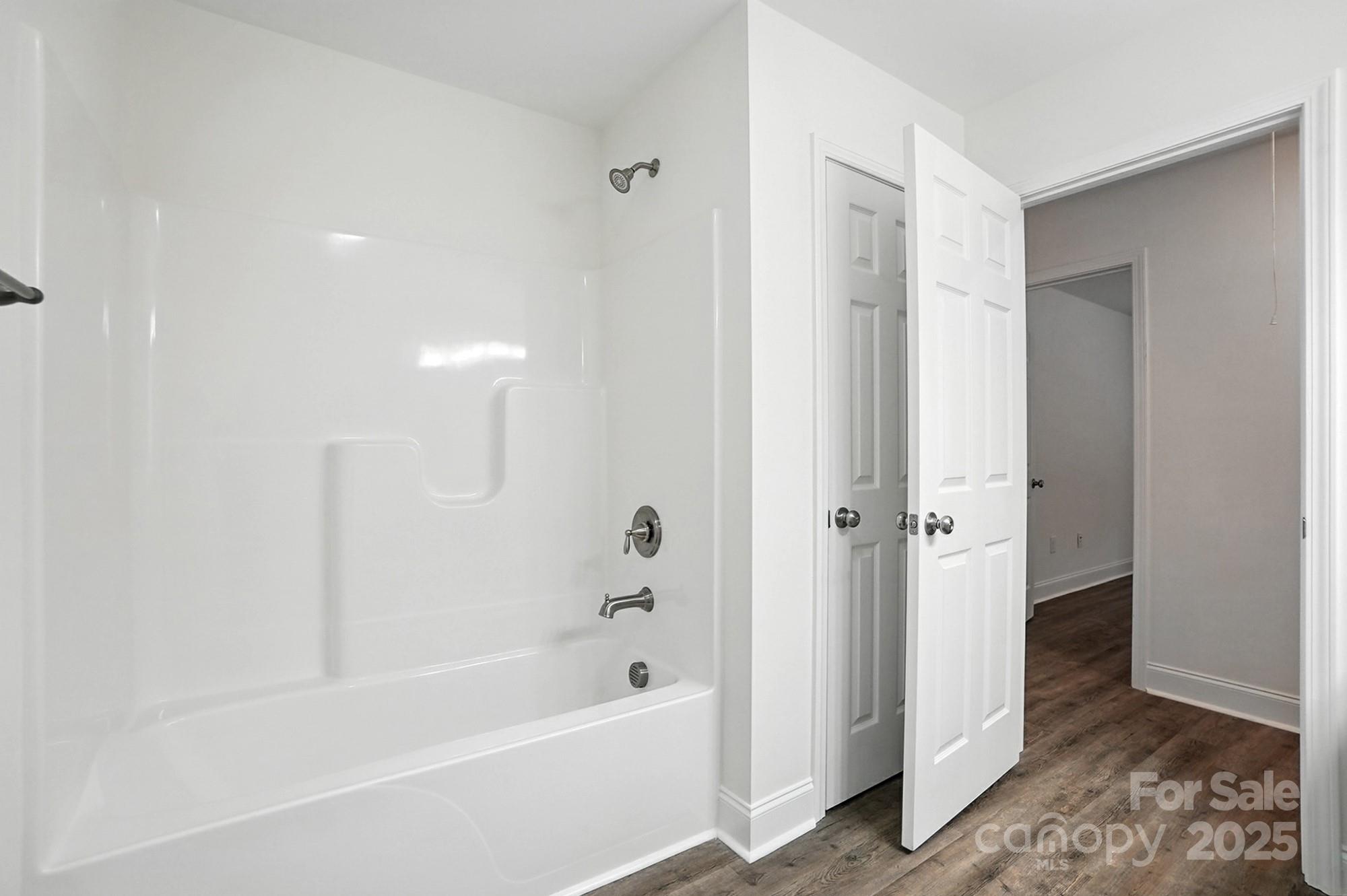 251 Lincoln Road York, SC 29745 - Photo 23 of 30 a bathroom with a bathtub and a shower