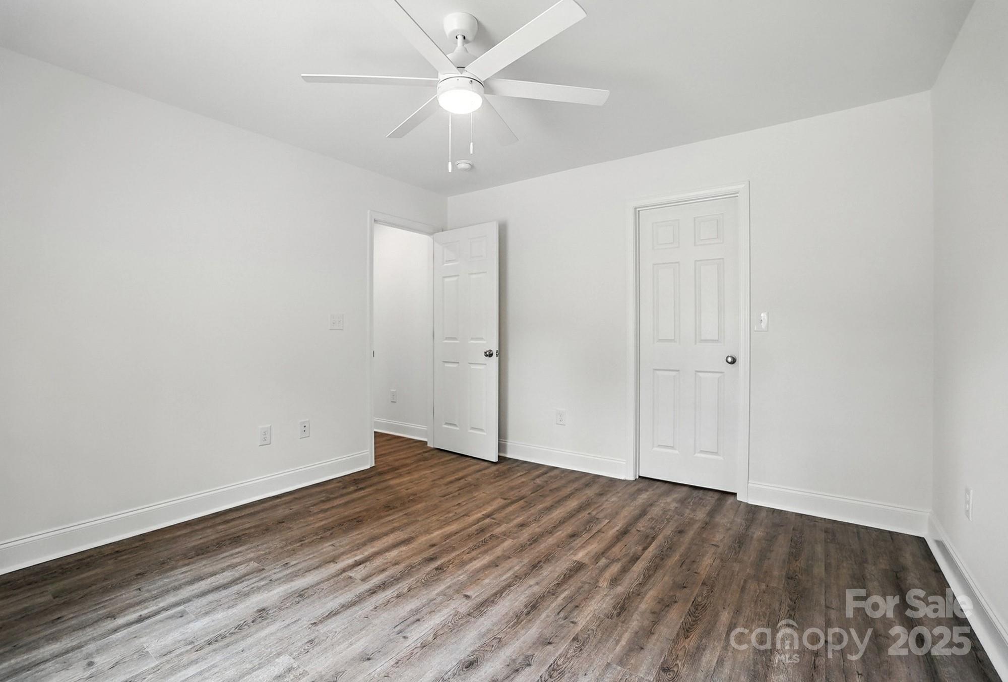 251 Lincoln Road York, SC 29745 - Photo 25 of 30 an empty room with wooden floor and windows