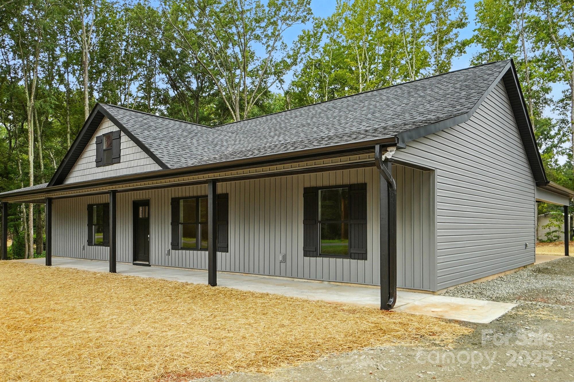 251 Lincoln Road York, SC 29745 - Photo 4 of 30 a house with trees in the background