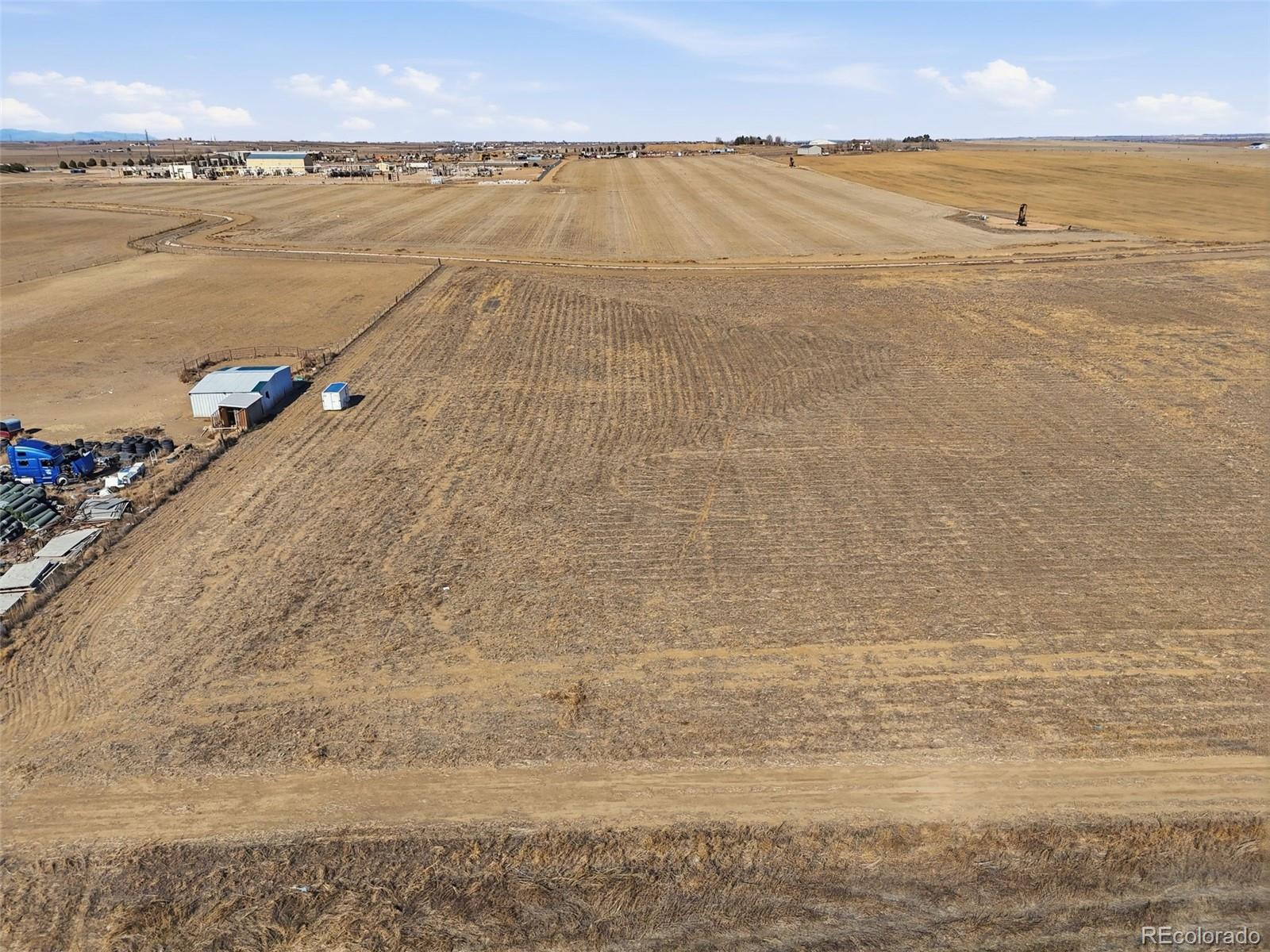 19 Wc Road Fort Lupton, CO 80621 - Photo 20 of 25 a view of an ocean and beach