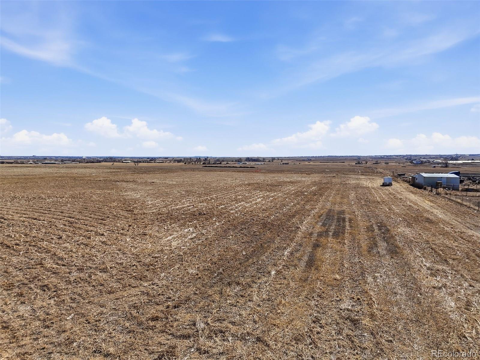 19 Wc Road Fort Lupton, CO 80621 - Photo 4 of 25 a view of an ocean beach and a city view