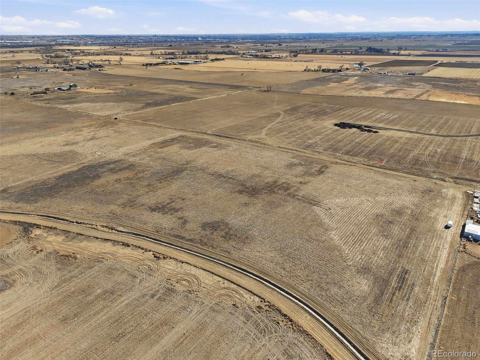 19 Wc Road Fort Lupton, CO 80621 - Photo 6 of 25 a view of an ocean and beach