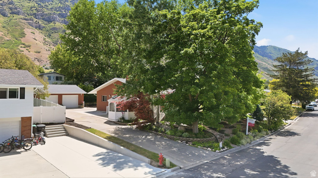 3120 North Apache Way Provo, UT 84604 - Photo 14 of 58 Extensive paved driveway with a lower-level garage entry