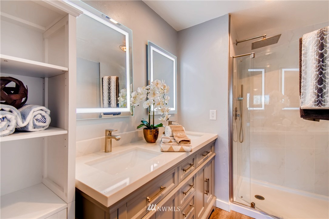 908 North 33rd Street Renton, WA 98056 - Photo 14 of 22 a bathroom with a sink vanity granite tub and shower