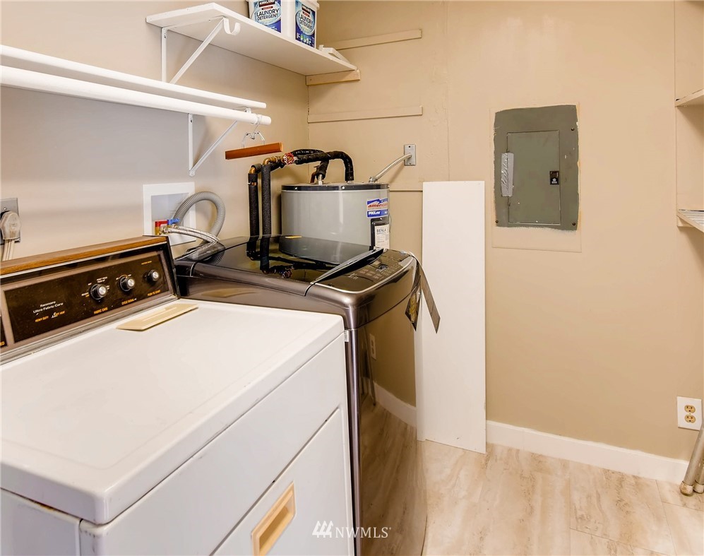 908 North 33rd Street Renton, WA 98056 - Photo 19 of 22 a utility room with dryer and washer