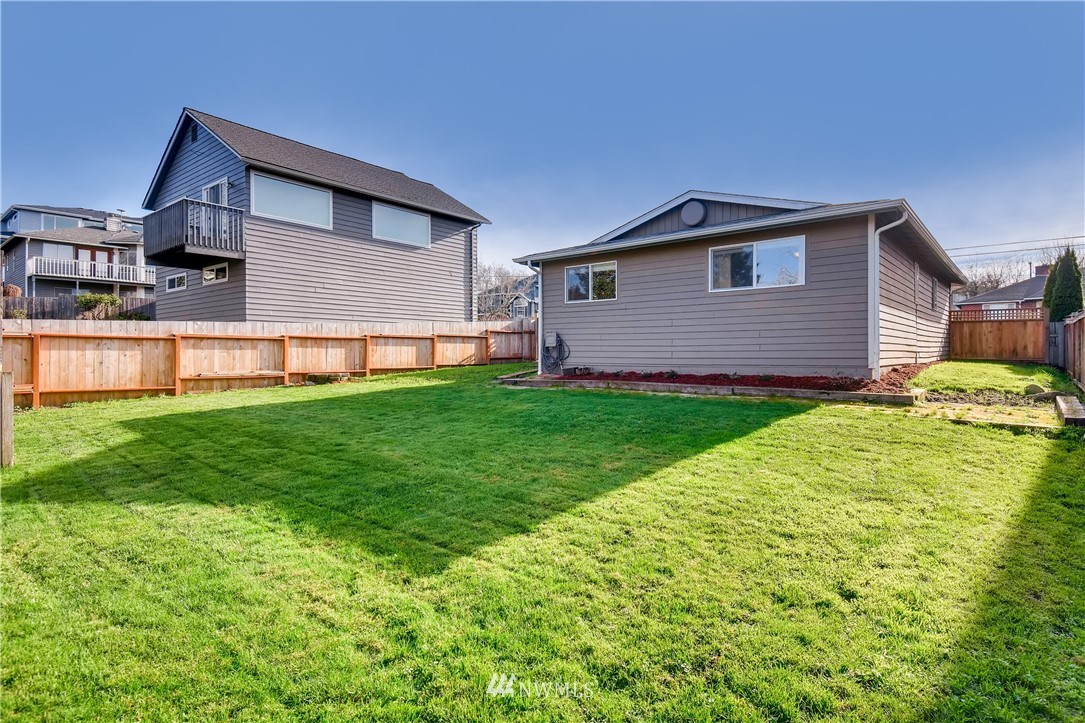 908 North 33rd Street Renton, WA 98056 - Photo 21 of 22 a front view of house with a garden