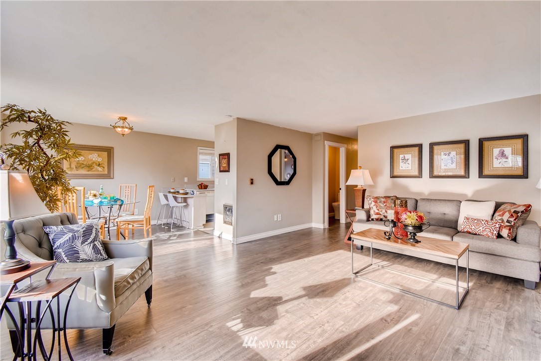 908 North 33rd Street Renton, WA 98056 - Photo 6 of 22 a living room with furniture and wooden floor
