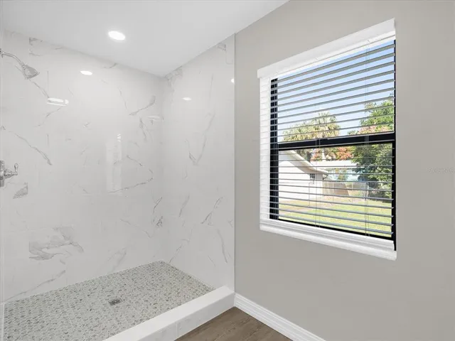 a view of a bathroom with a window