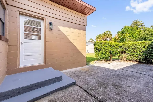 a view of a backyard of the house