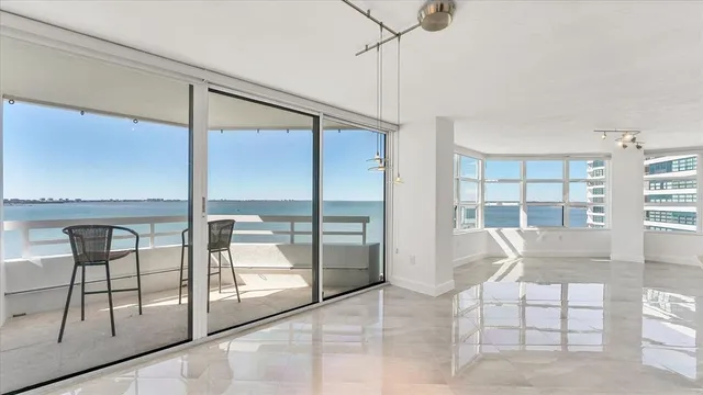 an empty room with windows