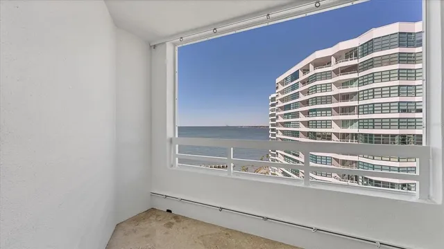 a view of a balcony with an ocean view