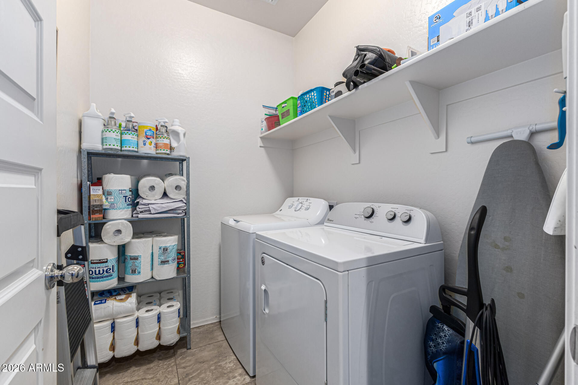 12214 West Del Rio Lane Avondale, AZ 85323 - Photo 24 of 32 a utility room with dryer and washer