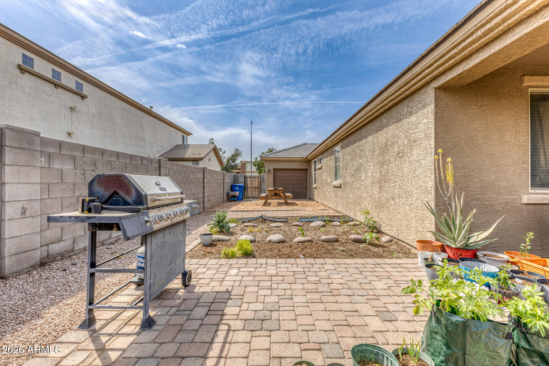 12214 West Del Rio Lane Avondale, AZ 85323 - Photo 26 of 32 a front view of a house with chairs
