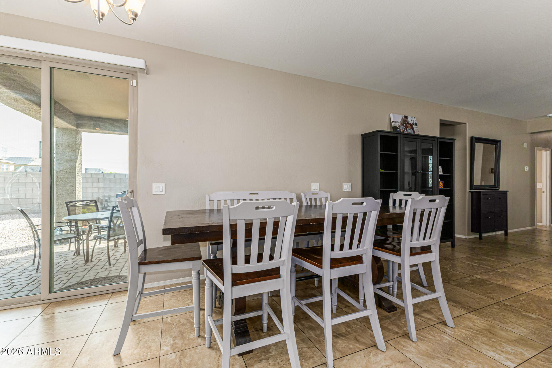 12214 West Del Rio Lane Avondale, AZ 85323 - Photo 9 of 32 a view of a dining room with furniture window and outside view