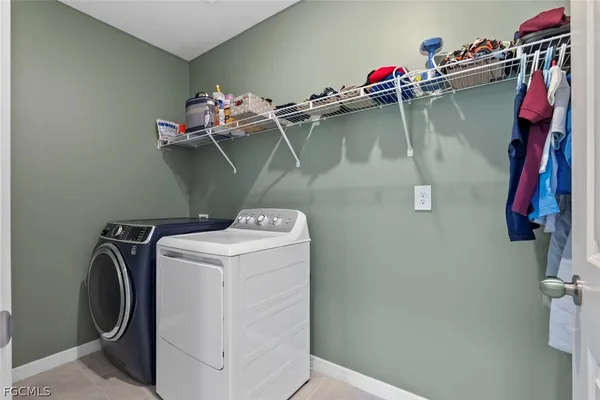 a bedroom with a bed and furniture