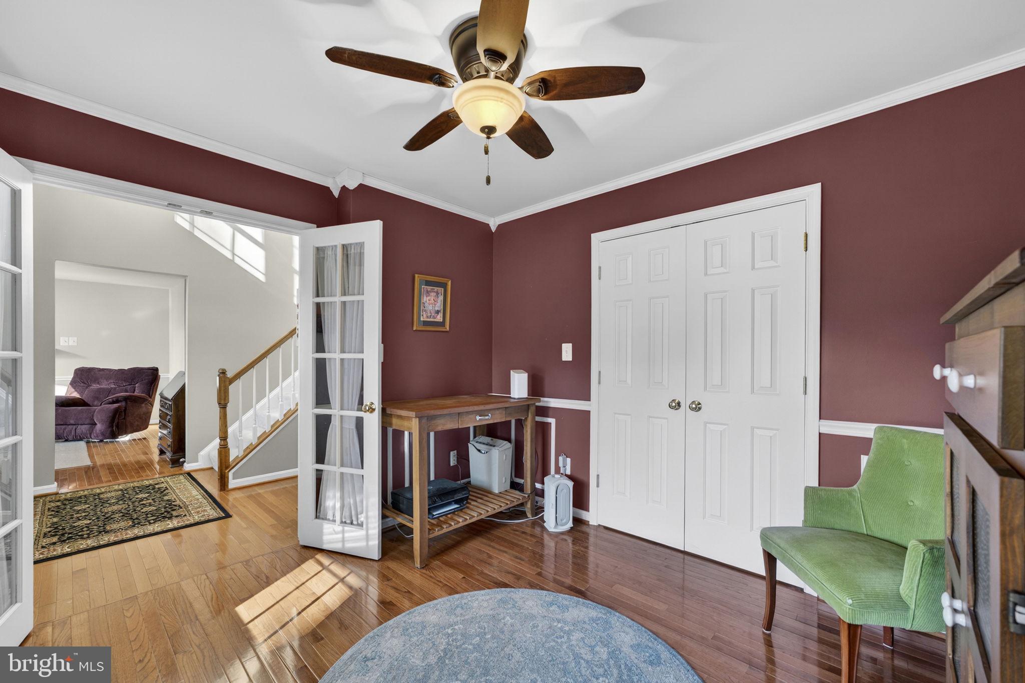 12376 Robin Road Culpeper, VA 22701 - Photo 12 of 70 a living room with furniture and a wooden floor