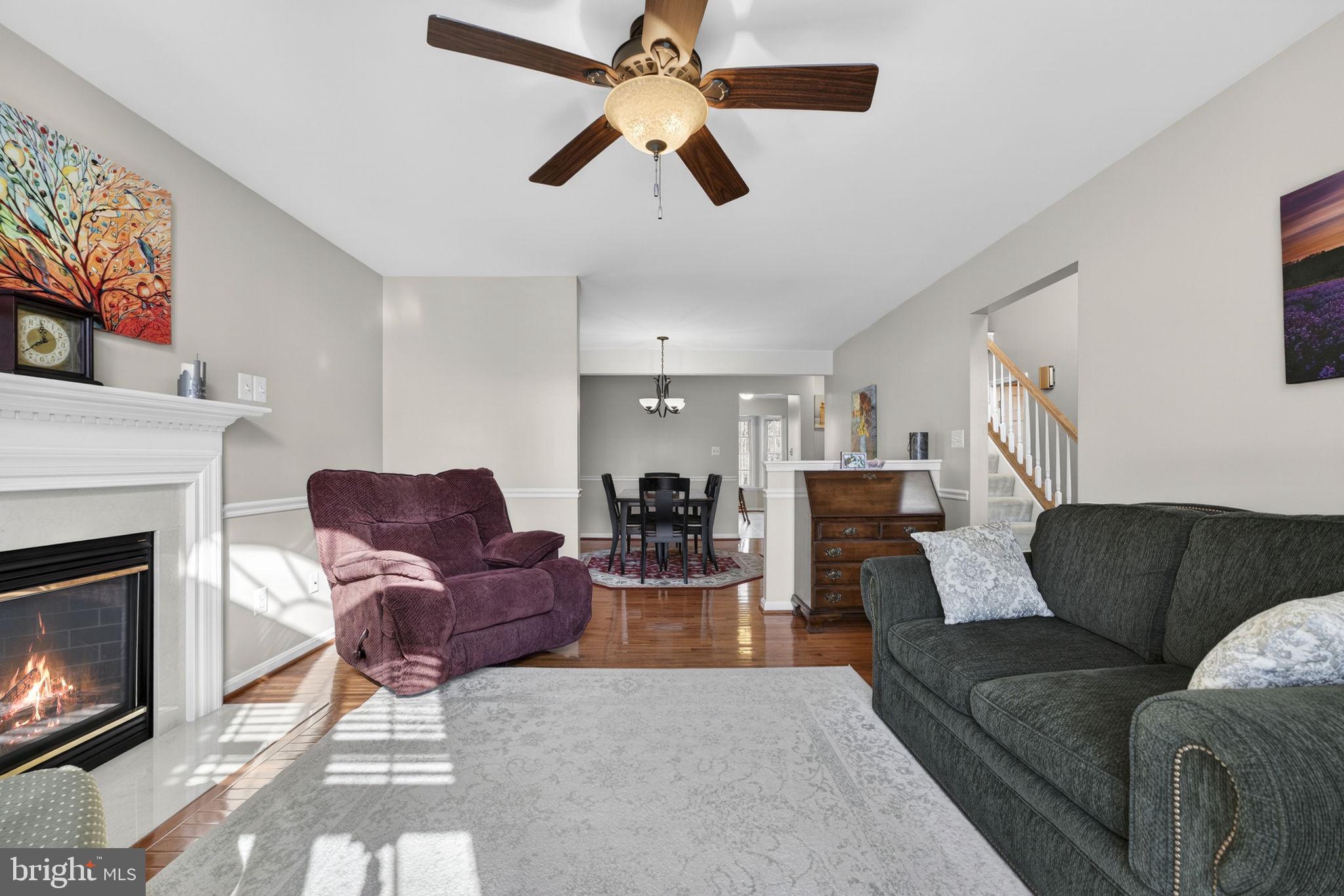12376 Robin Road Culpeper, VA 22701 - Photo 16 of 70 a living room with furniture fireplace and flat screen tv