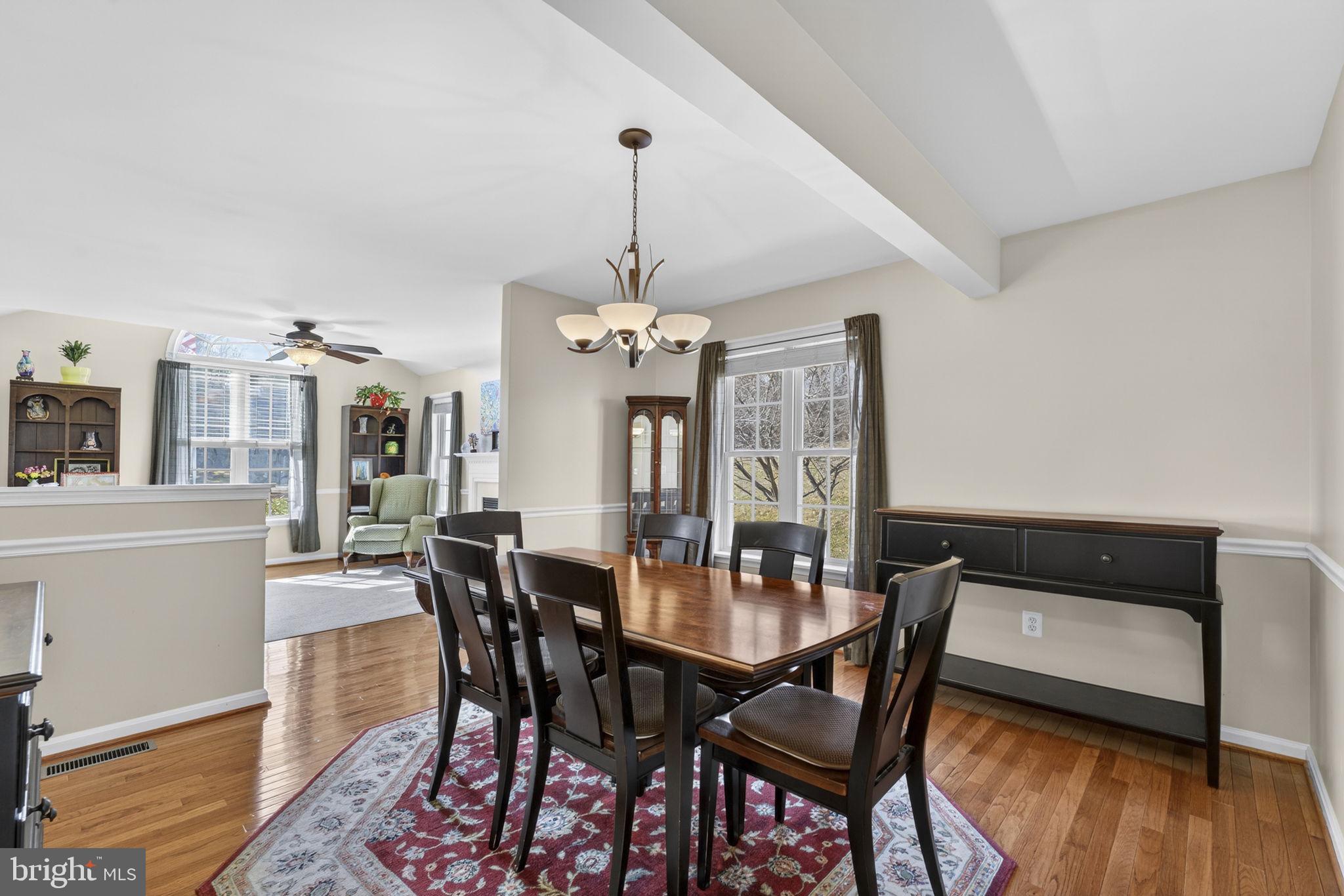 12376 Robin Road Culpeper, VA 22701 - Photo 19 of 70 a view of a dining room with furniture and wooden floor