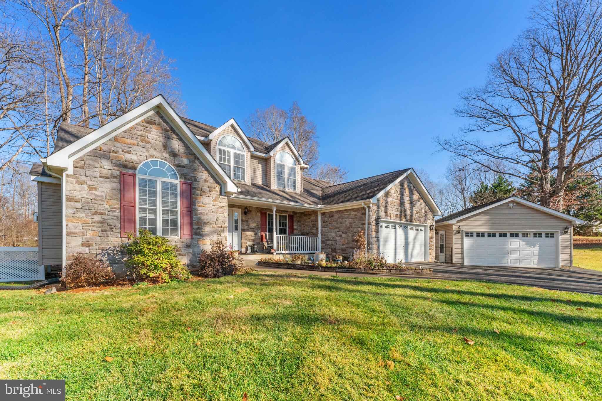 12376 Robin Road Culpeper, VA 22701 - Photo 2 of 70 a front view of a house with garden
