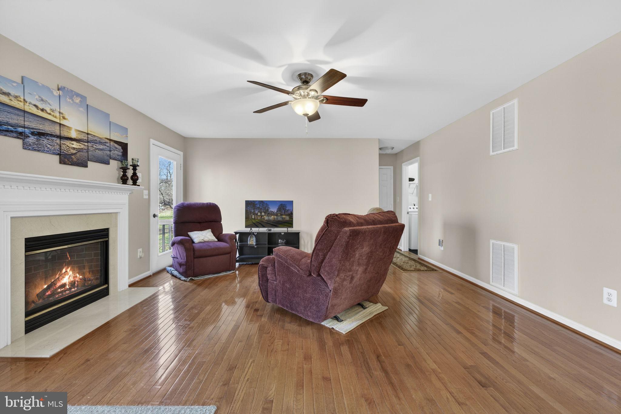 12376 Robin Road Culpeper, VA 22701 - Photo 21 of 70 a living room with furniture and a fireplace