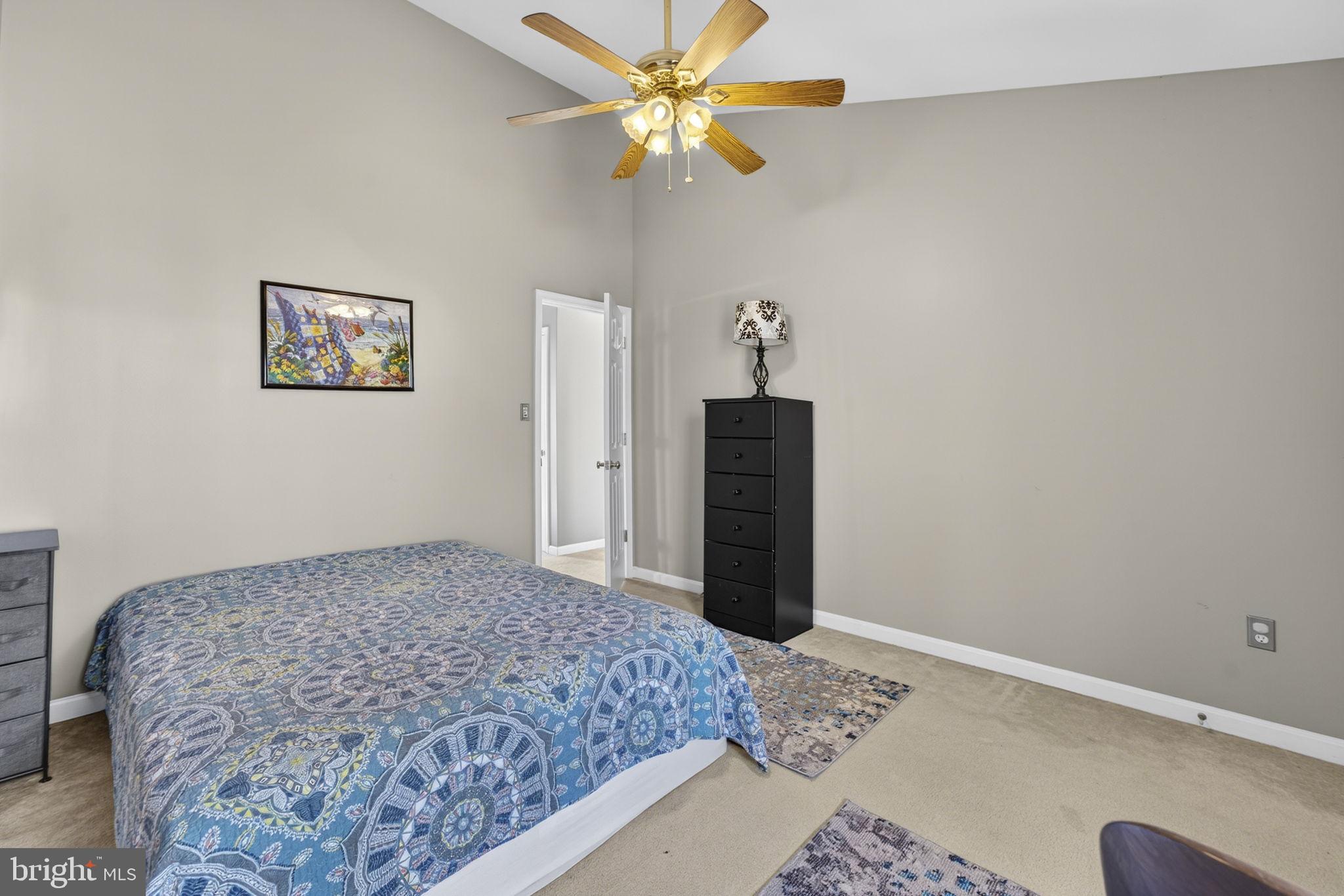 12376 Robin Road Culpeper, VA 22701 - Photo 46 of 70 a bedroom with a bed and a table in it