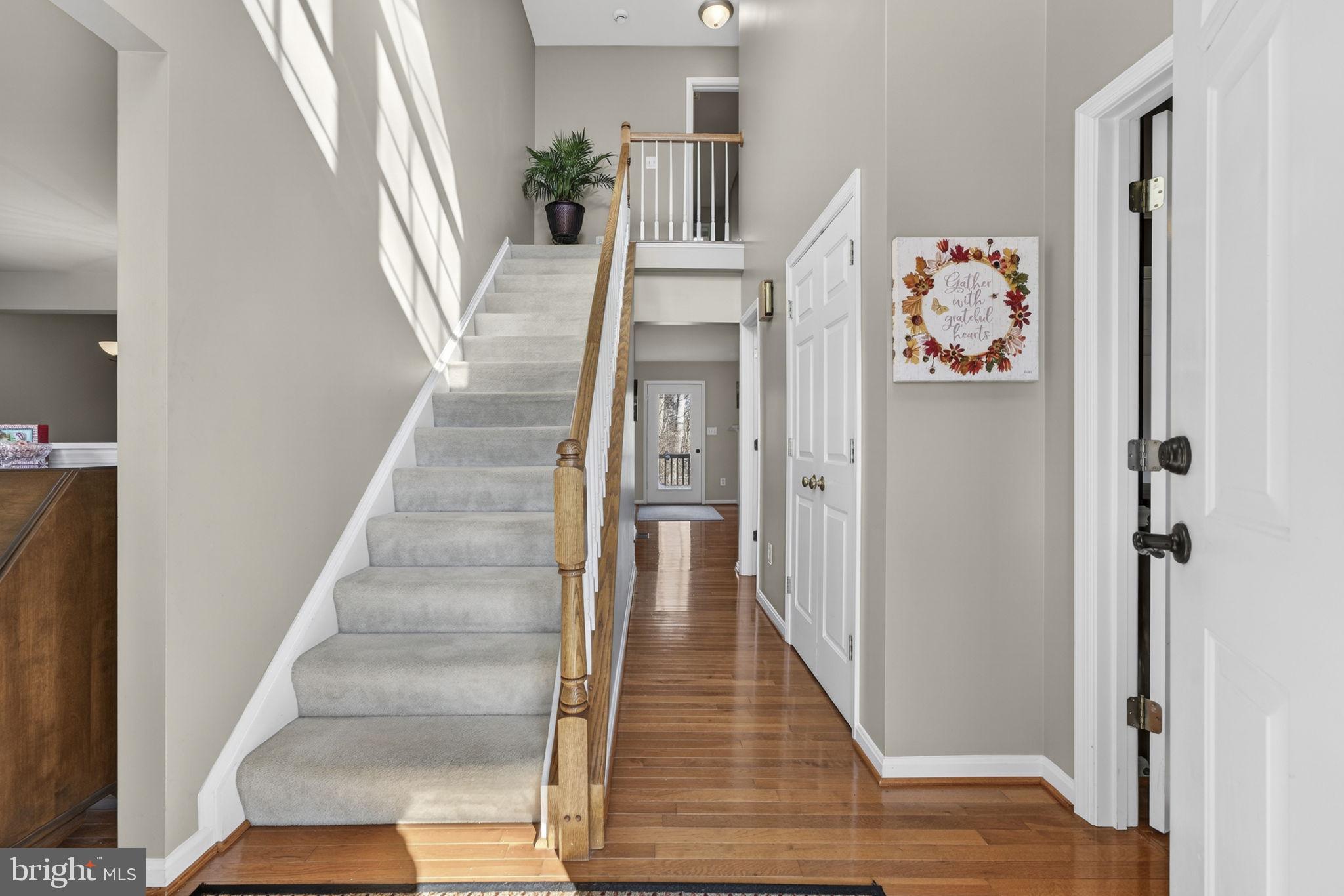 12376 Robin Road Culpeper, VA 22701 - Photo 10 of 70 a view of a hallway with wooden floor and entryway