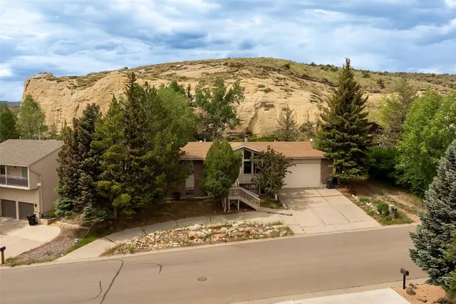 an aerial view of residential house with outdoor space