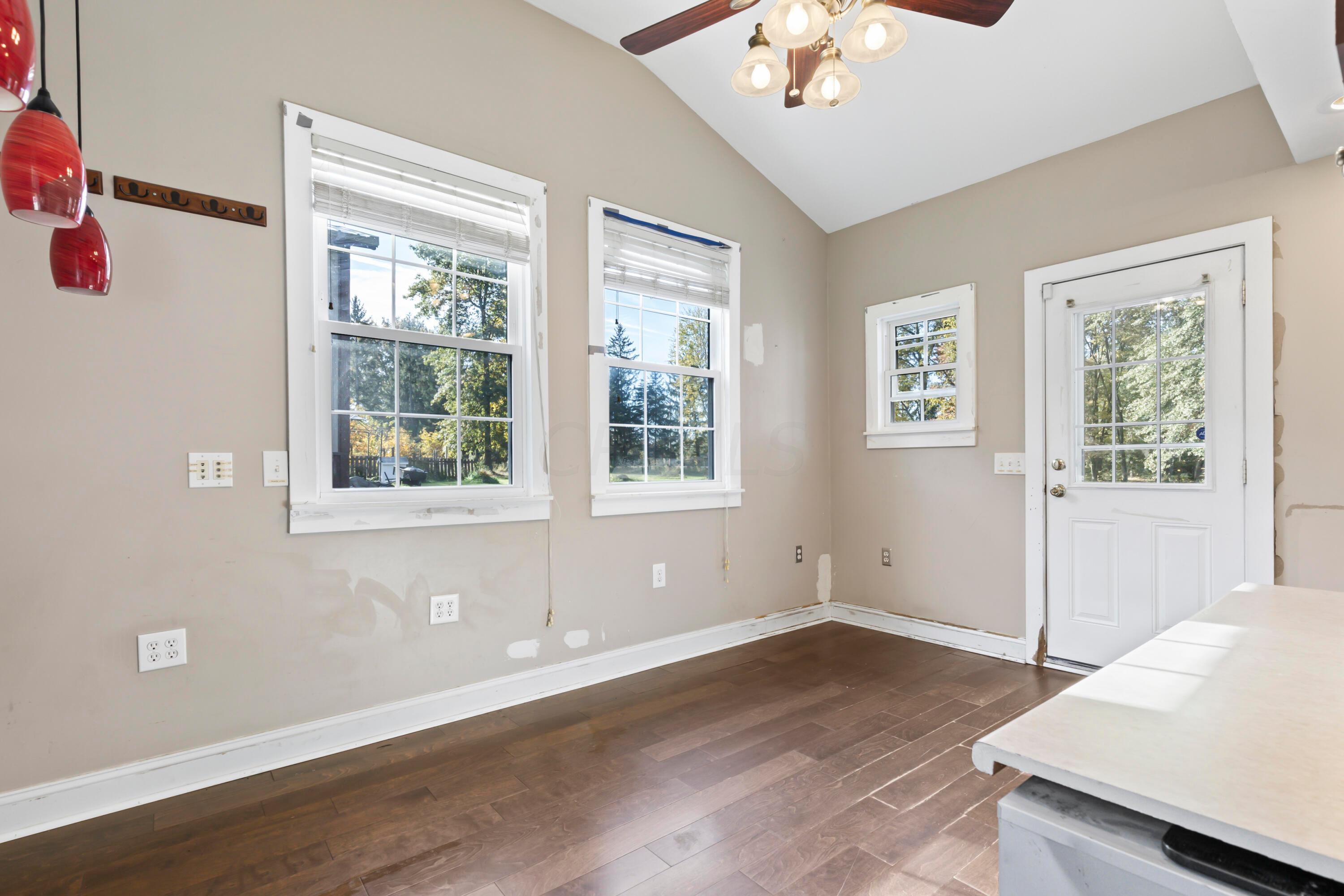 9495 Kilbourne Road Sunbury, OH 43074 - Photo 37 of 84 • New engineered hardwood
flooring May 2017
• Tan painted walls
• Lighted ceiling fan
• Coffered ceiling
• Window air conditioning
unit remains
• Wall cabinets
• Can lighting
• Door front walk/drive
• Built-in desk/counter
• Pendant lighting