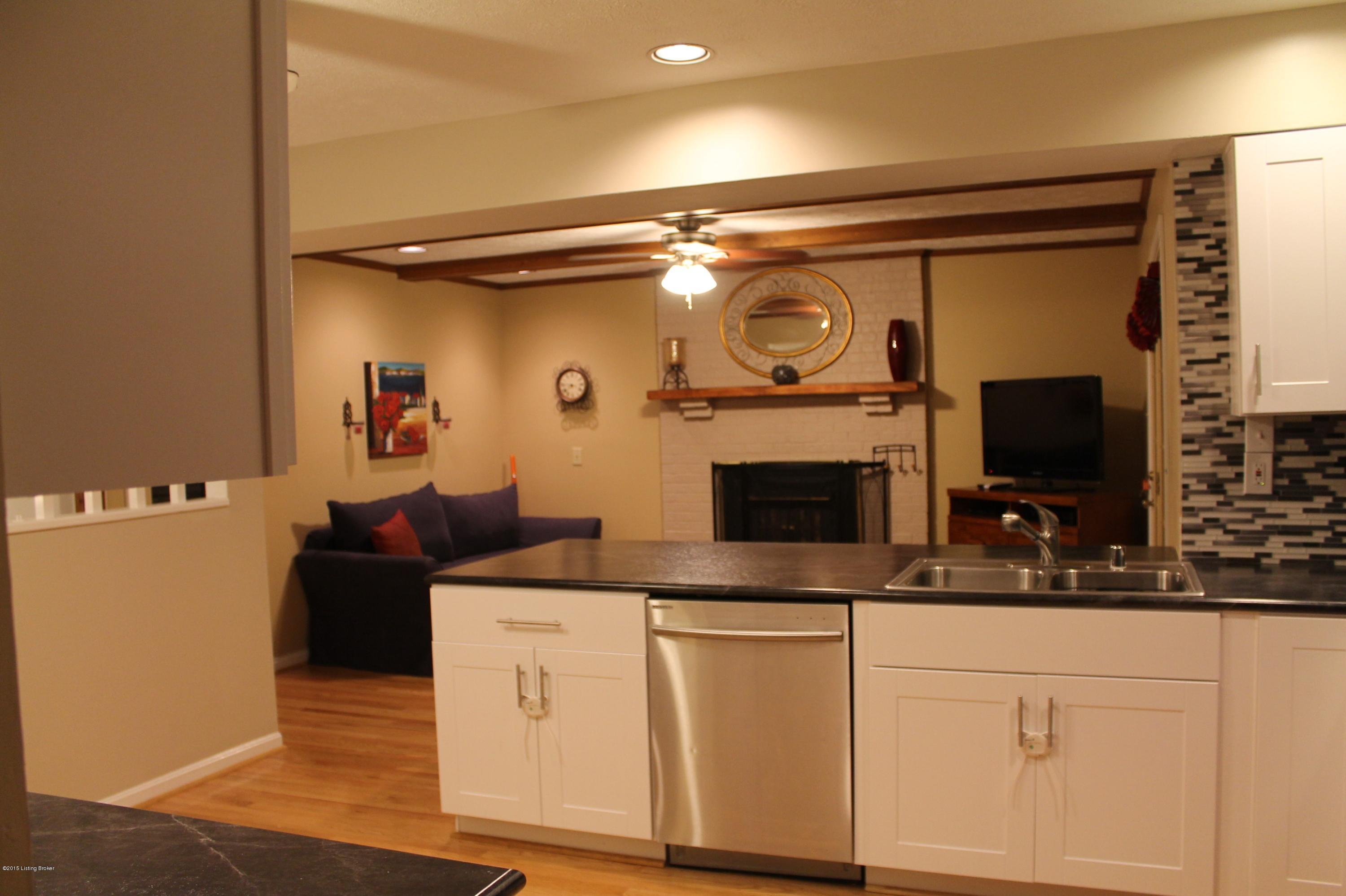 7805 Laurel Ridge Road Louisville, KY 40219 - Photo 12 of 77 Kitchen & family room with fireplace