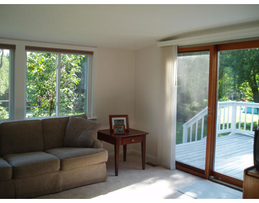 22 Warren Road Sudbury, MA 01776 - Photo 8 of 9 a living room with furniture and a window