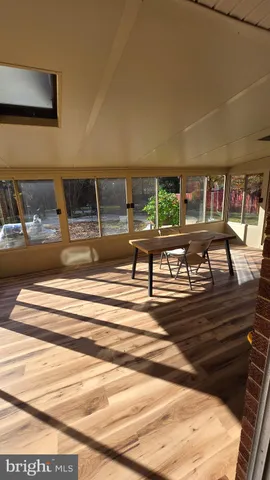 a view of a living room with furniture