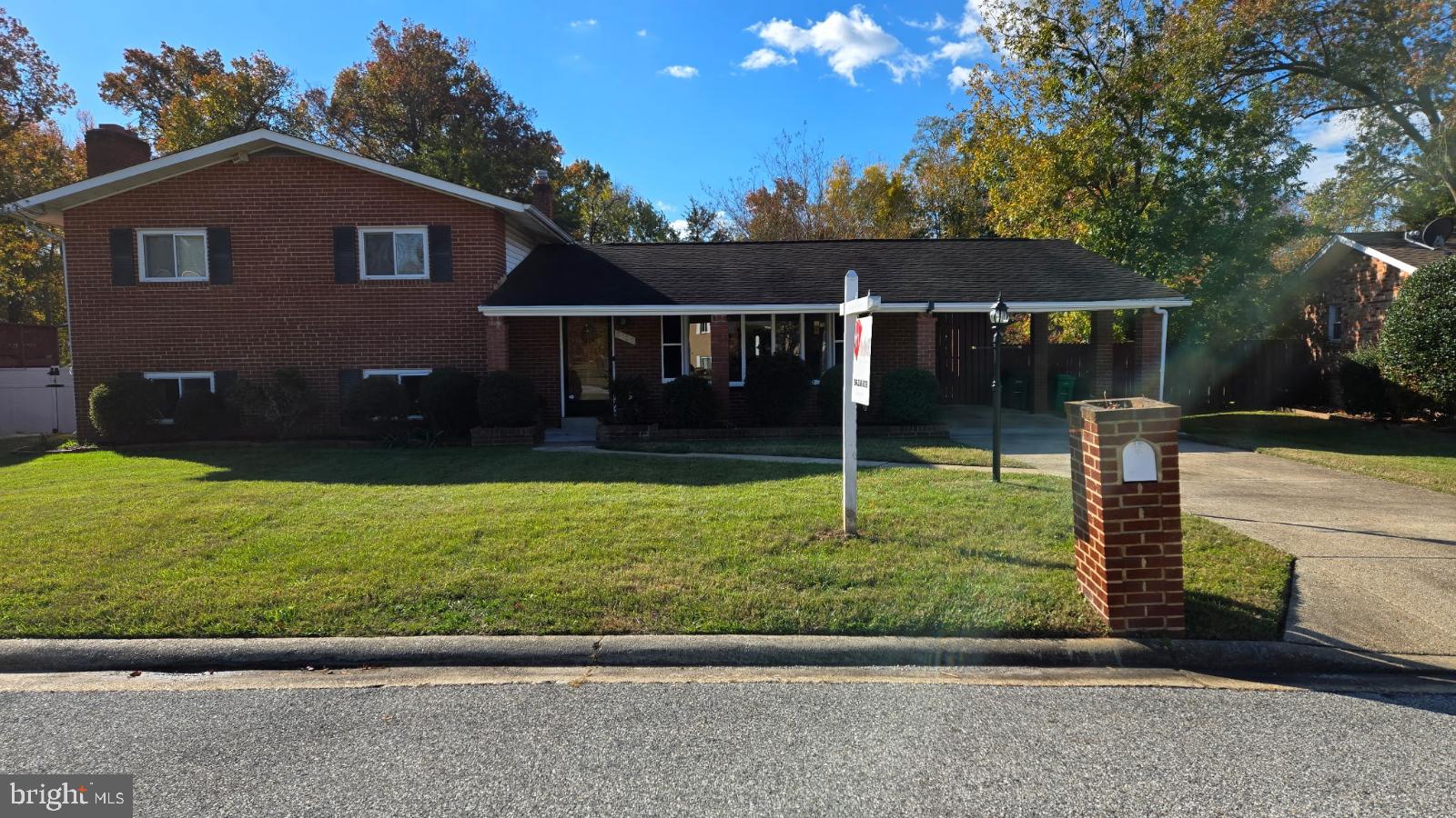 2105 Calhoun Street Fort Washington, MD 20744 - Photo 2 of 13 a front view of a house with a yard