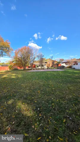 a view of a field with an outdoor space