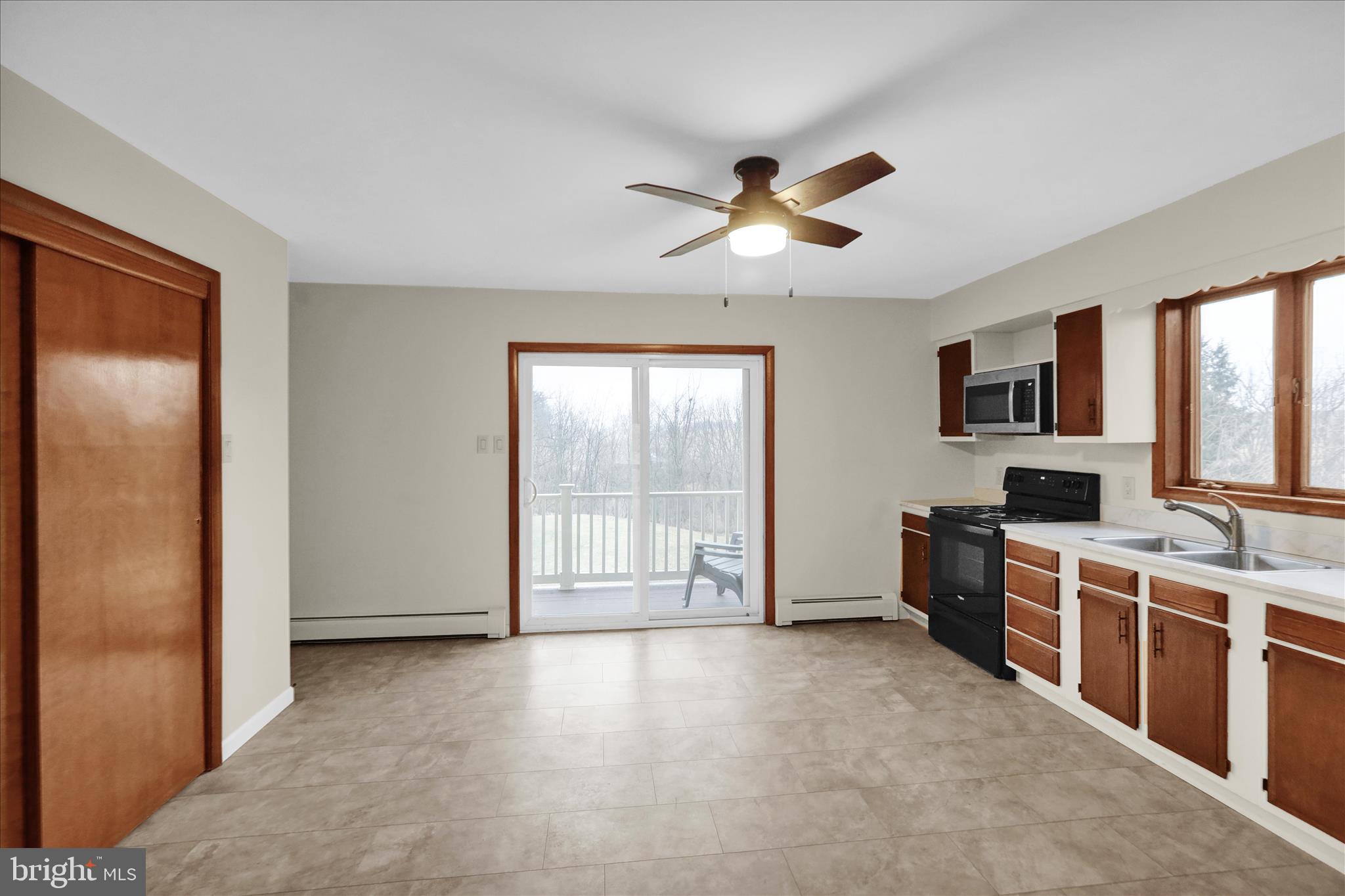 1613 Shoey Road, Unit A Mohrsville, PA 19541 - Photo 2 of 17 a view of a kitchen with a sink and a window