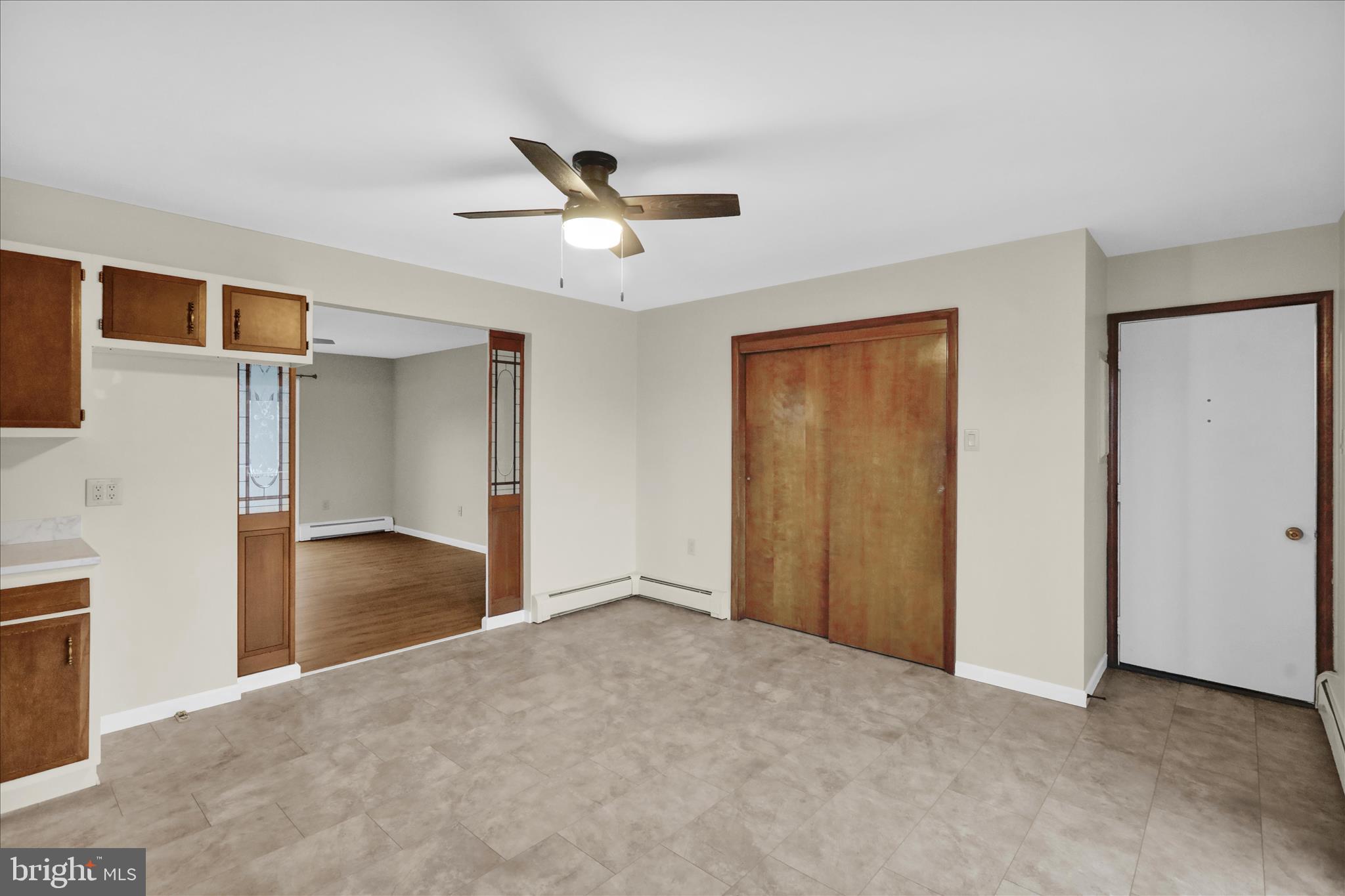 1613 Shoey Road, Unit A Mohrsville, PA 19541 - Photo 9 of 17 a view of livingroom with hardwood floor and ceiling fan