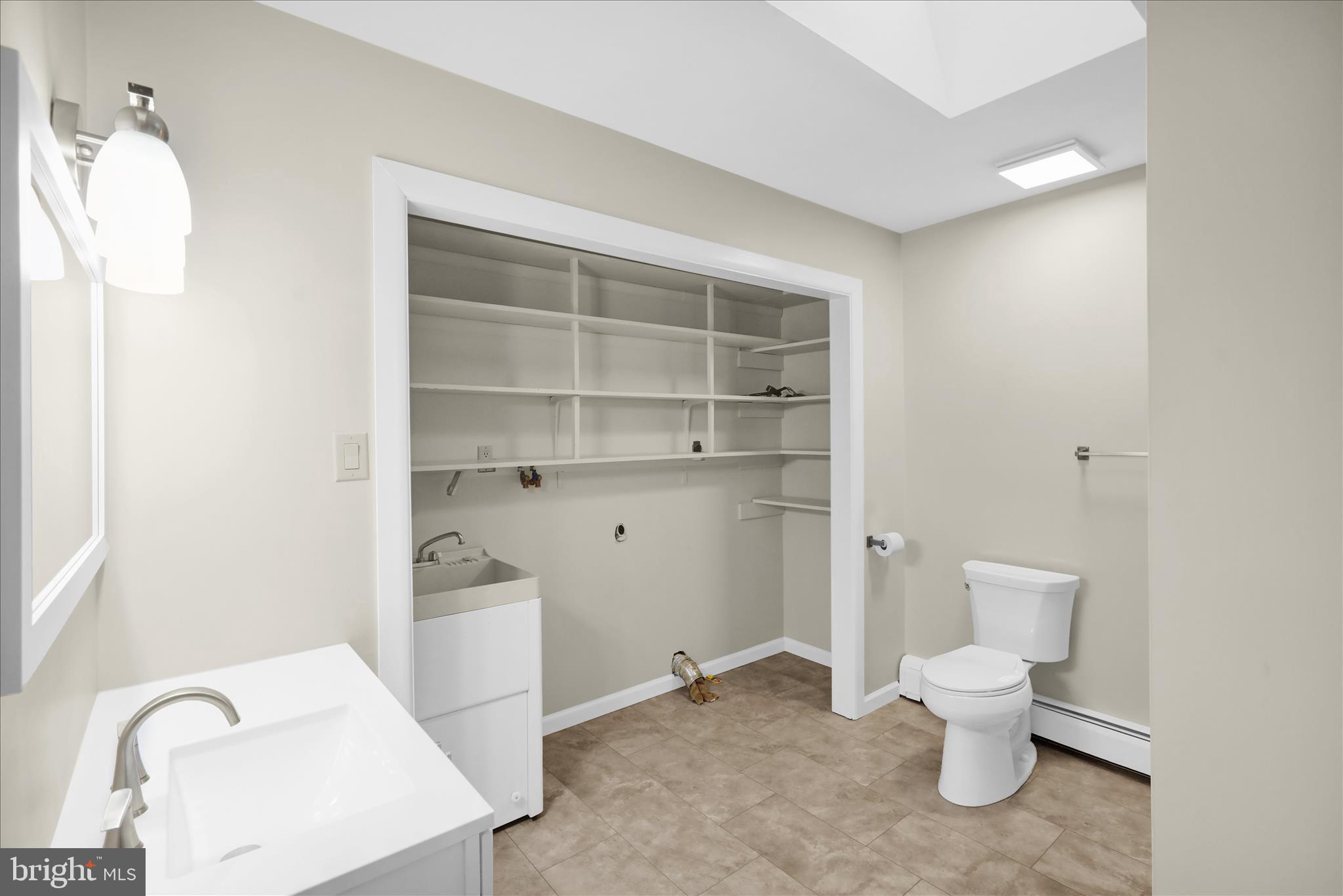 1613 Shoey Road, Unit A Mohrsville, PA 19541 - Photo 10 of 17 a bathroom with a toilet and a sink