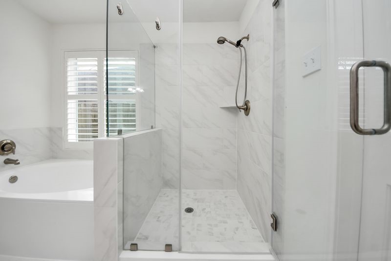 20831 Deauville Drive Spring, TX 77388 - Photo 29 of 42 Light and bright walk-in shower with frameless door.
