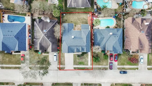 an aerial view of waterside residential houses