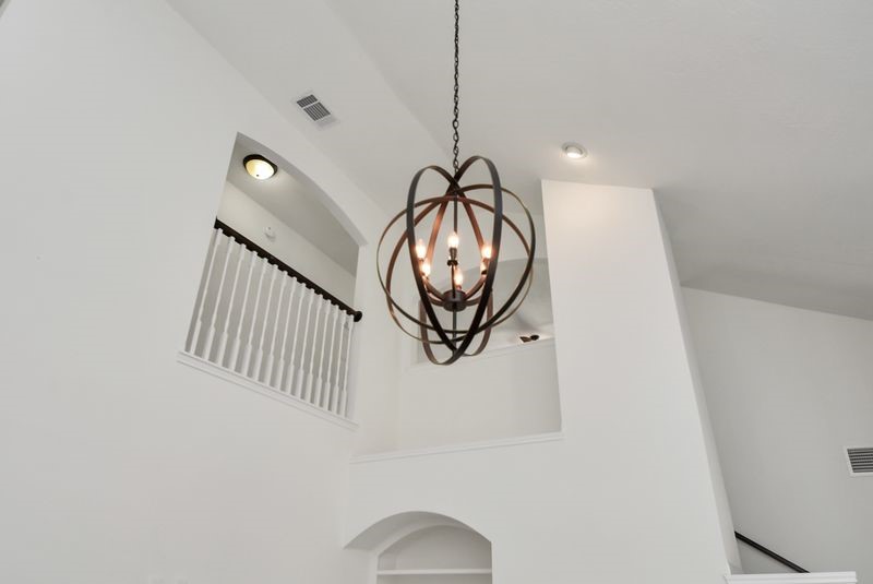 20831 Deauville Drive Spring, TX 77388 - Photo 4 of 42 Cathedral ceiling with "edgy" light feature!
