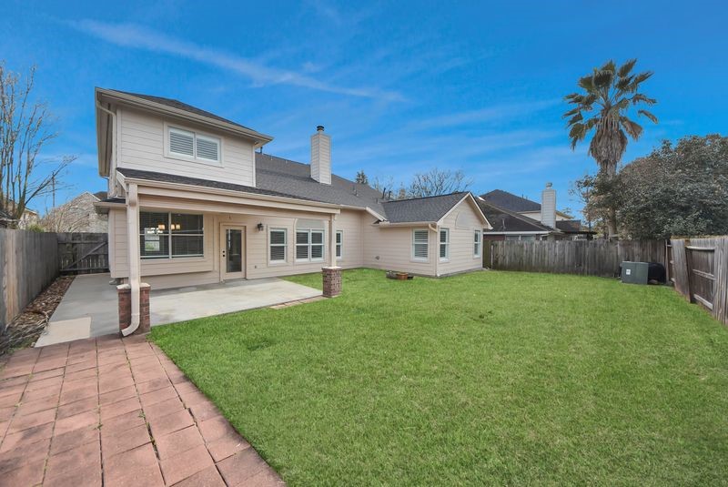 20831 Deauville Drive Spring, TX 77388 - Photo 42 of 42 View of the back of the home and the covered porch.